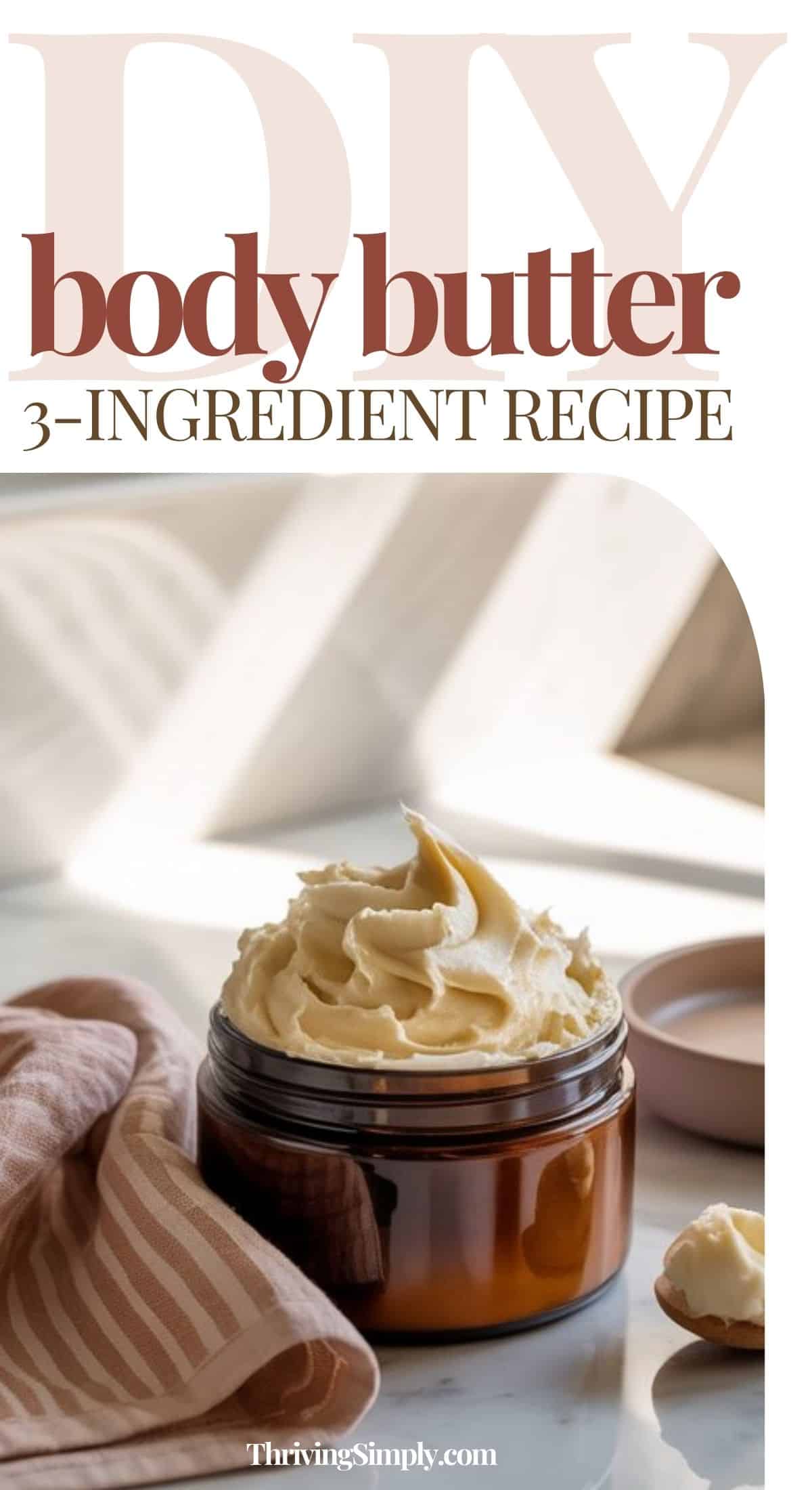 A brown jar of Nourishing Body Butter sits on a white surface beside a striped cloth and small dish, with text reading DIY 3-Ingredient Body Butter recipe. Soft light streams through a window in the background.